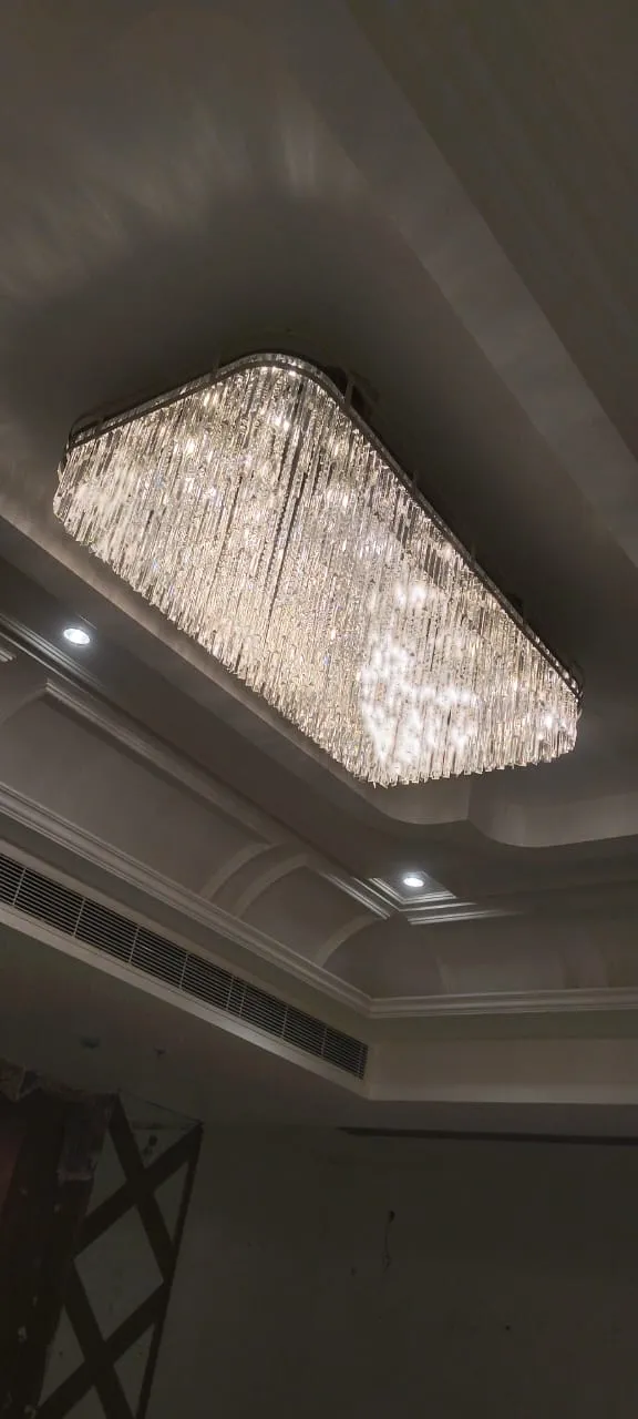 Large rectangular crystal jhumar installation with premium glass crystals for luxury ceiling lighting